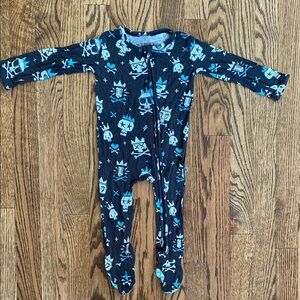 Blue/black Little Bum Bums skull print, 2 way zip footie, size 12-18 months.